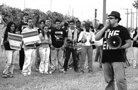 the new generation of organizers: Image shows Jose Luis Marantes speaking at a rally.
