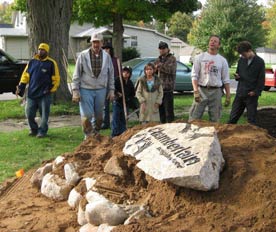 Image shows volunteers working on a garden in Indiana