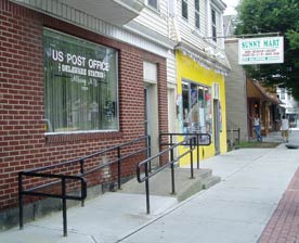 USPS: photo shows front of post office in New York State