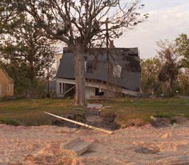 Photo of a house damaged by Hurricane Katrina