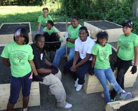 shrinking cities: images shows youth in green T-shirts, the "Green Team" of a Cleveland CDC.