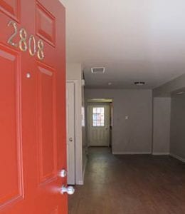 preserving aging affordable housing. An entrance to an apartment in the Adolfina Villanueva Townhouses