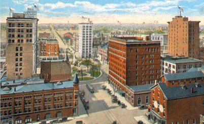 image is a vintage postcard showing aerial view of Youngstown, Ohio