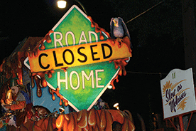 Image shows a parade float that satirizes the Road Home program