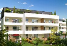 A white three-level building.