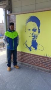 Young man with his Front Porch portrait.