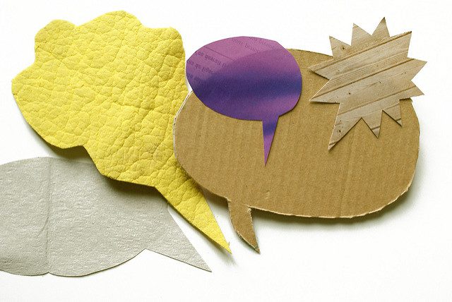 Word bubbles made of paper materials.