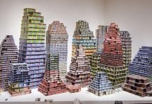Buildings composed of lottery tickets.