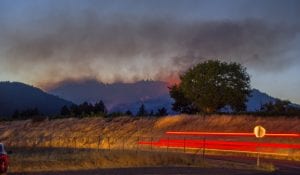 Smoke over California hills.