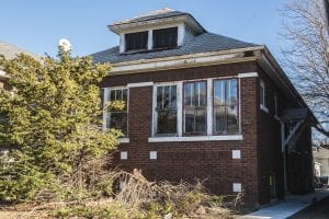 Rental housing in Chicago before it the home was rehabbed.