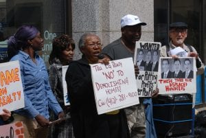 A group of Pittsburgh residents protest.