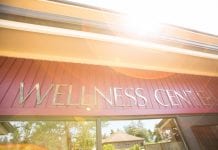 A sign that reads "wellness center."