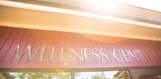 A sign that reads "wellness center."