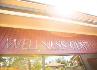 A sign that reads "wellness center."