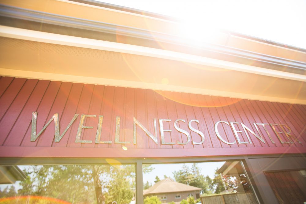 A sign that reads "wellness center."