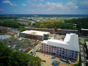 A senior housing building at Mercy Housing Southeast’s Mercy Park development, where health and housing partnerships work.