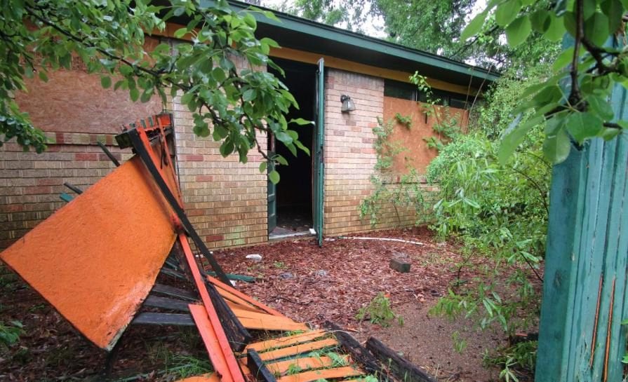 dilapidated home's front entrance