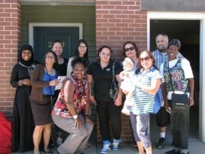The first community justice land trust tenants at Grace Townhomes. Photo courtesy of DHCD