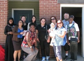 The first community justice land trust tenants at Grace Townhomes. Photo courtesy of DHCD