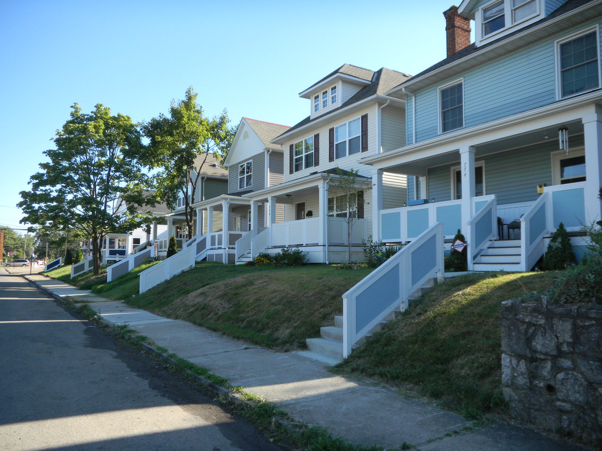 A row of four to five homes in the south Side of Chicago. The homes have been renovated.