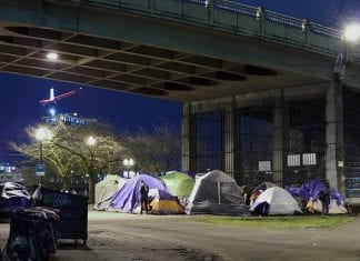 homeless camp under bridge