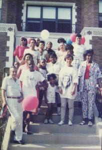 Members of a limited-equity housing cooperative in D.C. gather on the front steps in the late 1980s/early 1990s.