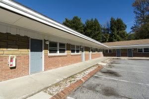 The Champlain Housing Trust purchased the Ho Hum Motel and renovated it into 19 micro apartments for frequent heath care users.