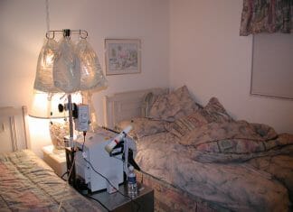 A hemodialysis machine in a bedroom.