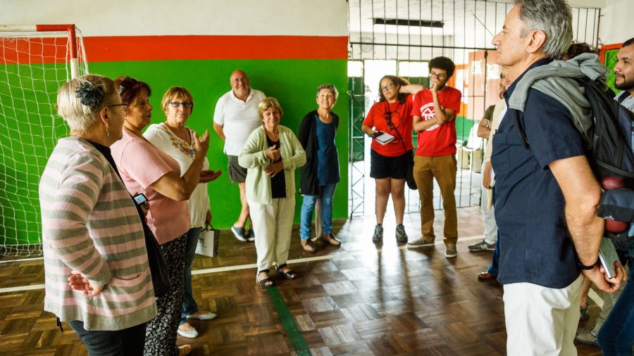 Mesa 5 cooperative members explain how the housing complex’s services and maintenance work.