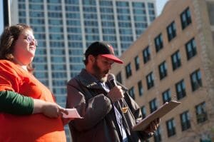 Chicago resident Tom Gordon speaks to a crowd. He, as well as other organizers, are fighting for a citywide community benefits campaign.