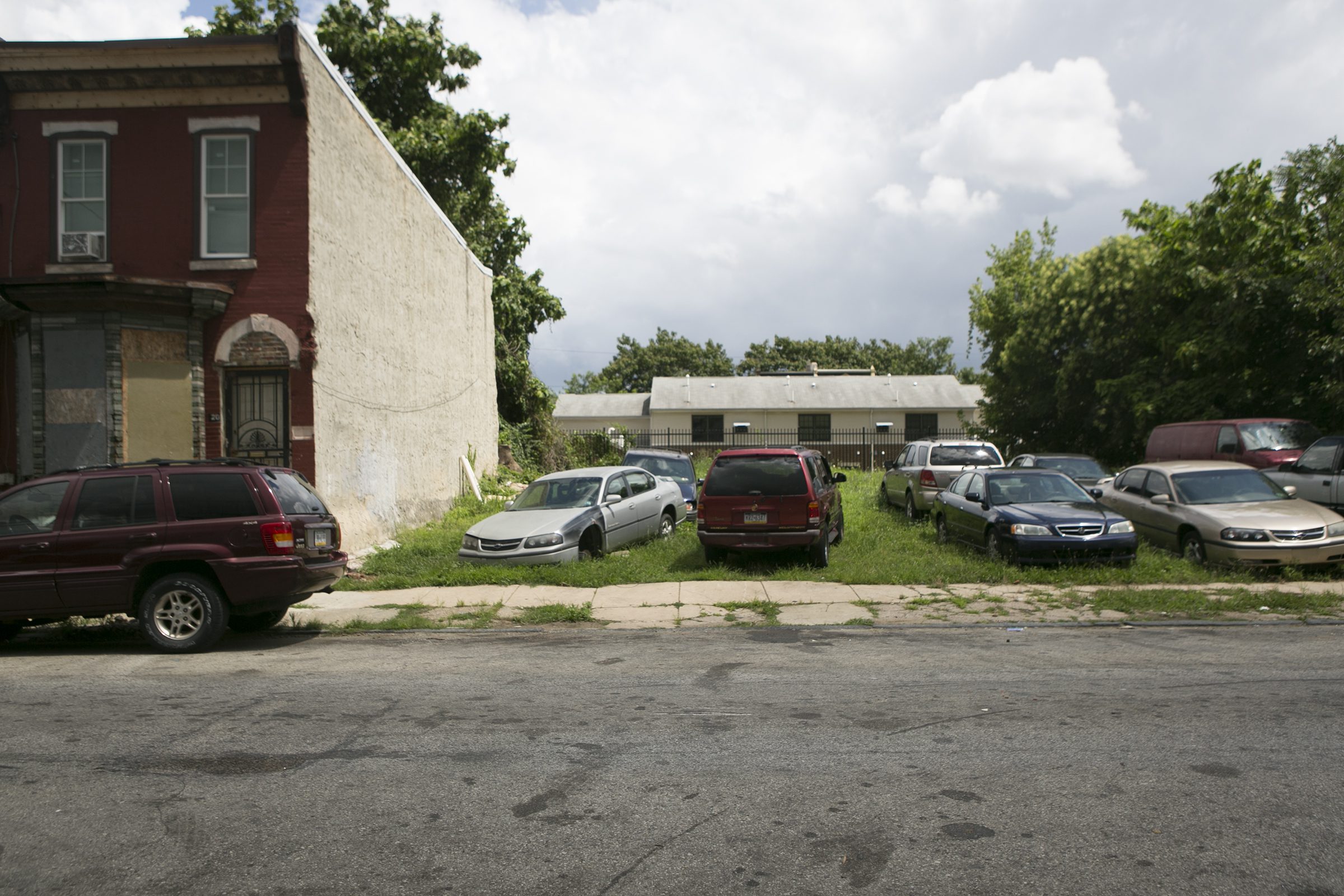 A vacant lot in Philly that serves as an unofficial parking lot.