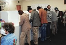 voters in booths