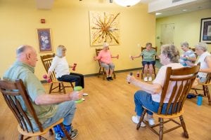 Seniors participate in an exercise class