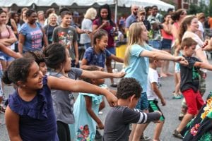 Kids dance at a neighborhood street festival in the Cleveland neighborhood of Old Brooklyn.