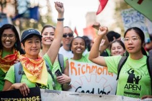 Amee Raval, Miya Yoshitani, Mei-ying Williams and JingJing He of APEN fighting for climate justice.