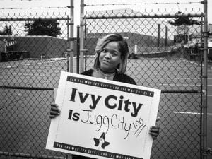 woman holding sign