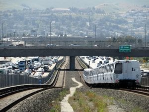 A Daly City-bound BART train west of Dublin/Pleasanton station.