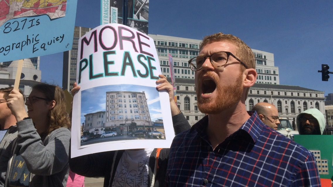 YIMBY Action members chant over activists of color during an counter protest in California.