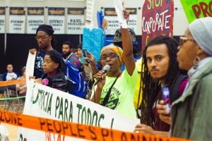 Lisa Owens, executive director of the housing justice organization City Life/Vida Urbana, led an interruption of the YIMBYtown national conference.