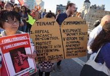 People at a rent-reform rally in New York City, 2015