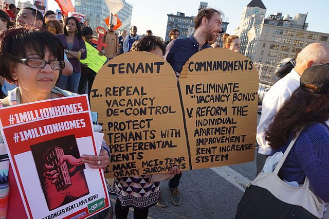 People at a rent-reform rally in New York City, 2015
