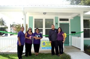 Ribbon cutting for GNDC community land trust home