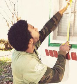 Man measures a window