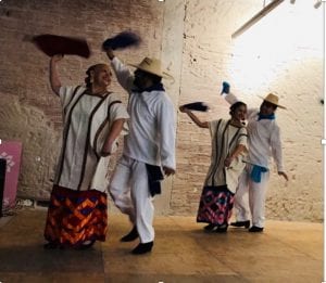 two couples dance in traditional Mexican ballet folklorico style