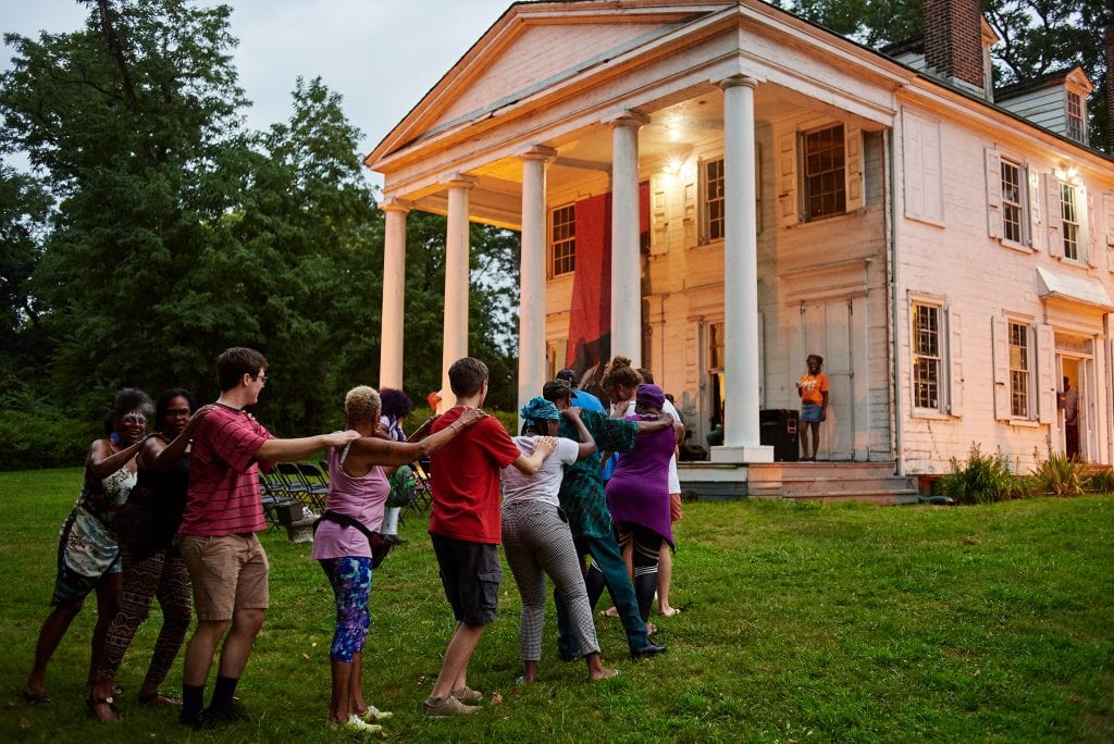 A conga line at the Hatfield Family Reunion held by Fairmount Park Conservancy, July 2018. Arts-based partnership