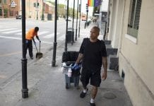 Sanitation worker Bobby Parker was illegally evicted from his home for paying his rent late. He's seen here, walking the streets of New Orleans.