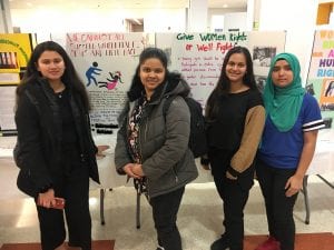 Asian community: Image shows four teenagers at a community event at South Asian Youth Action