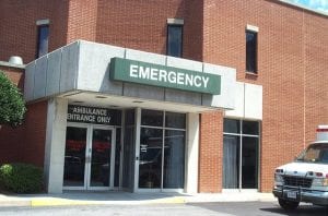 housing is health care: photo shows exterior of a hospital emergency room 