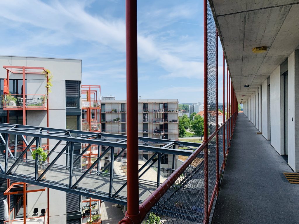 View from outdoor gallery on an upper floor at Zwicky Zud, a nonprofit cooperative in Zurich. 