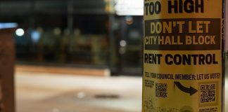 A "Rent is too high" flyer in South Minneapolis.
